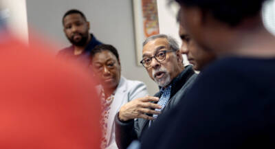 Mr Mohamed Shaik speaking about how community engagement enhances the quality and relevance of academic research.